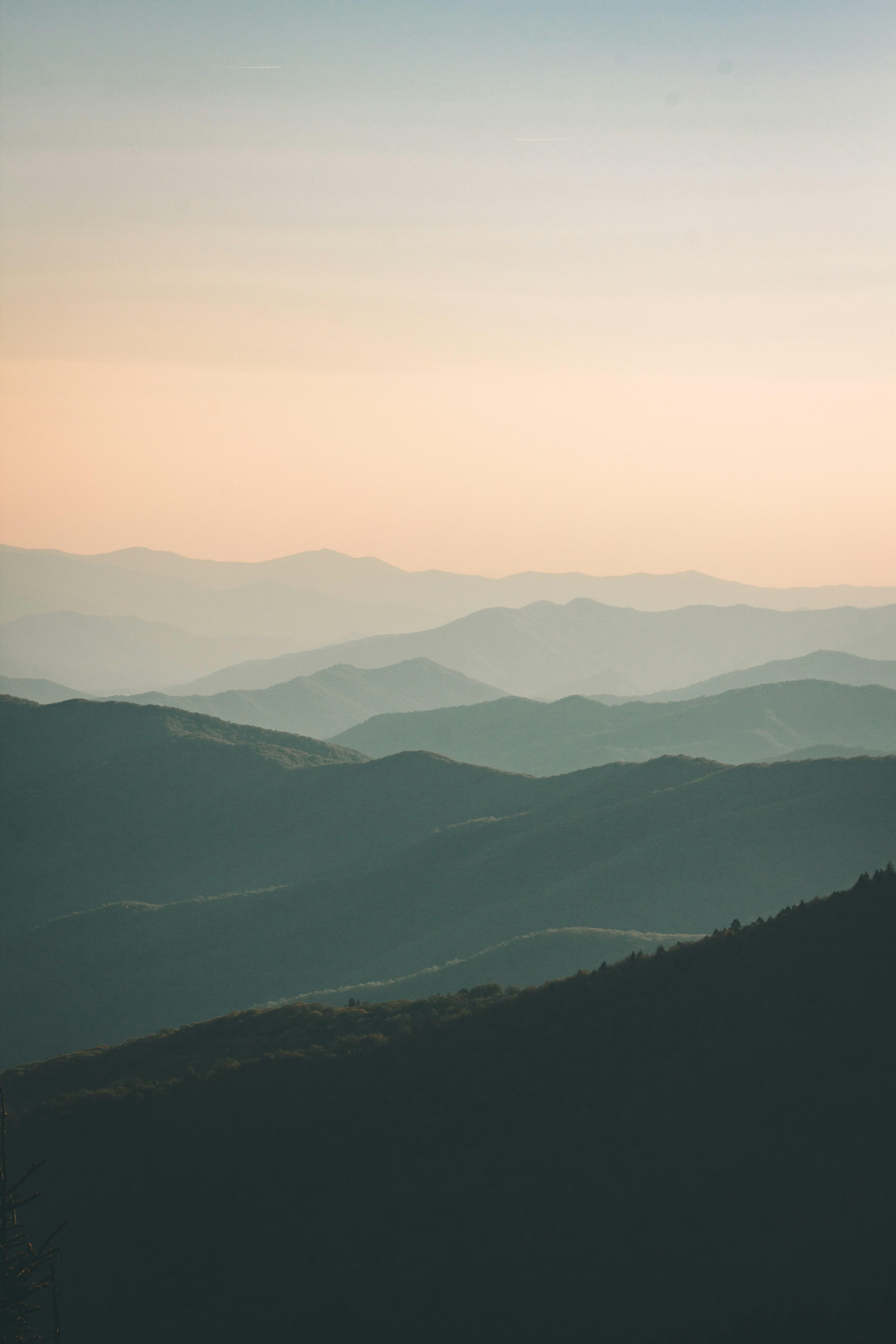 Mountain dusk background representing growth and reflection